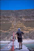 John looks up the winch line to the top of Althorpe, waiting for the skip